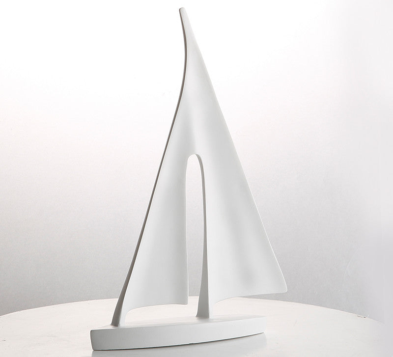 Sailboat-shaped lamp on a white background