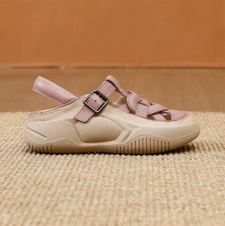 Pink sandal with a thick sole on a textured surface