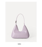 Purple handbag on a white background