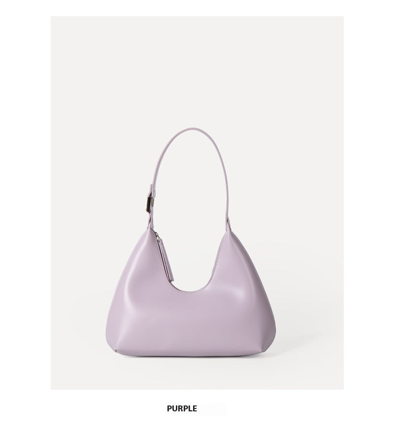 Purple handbag on a white background