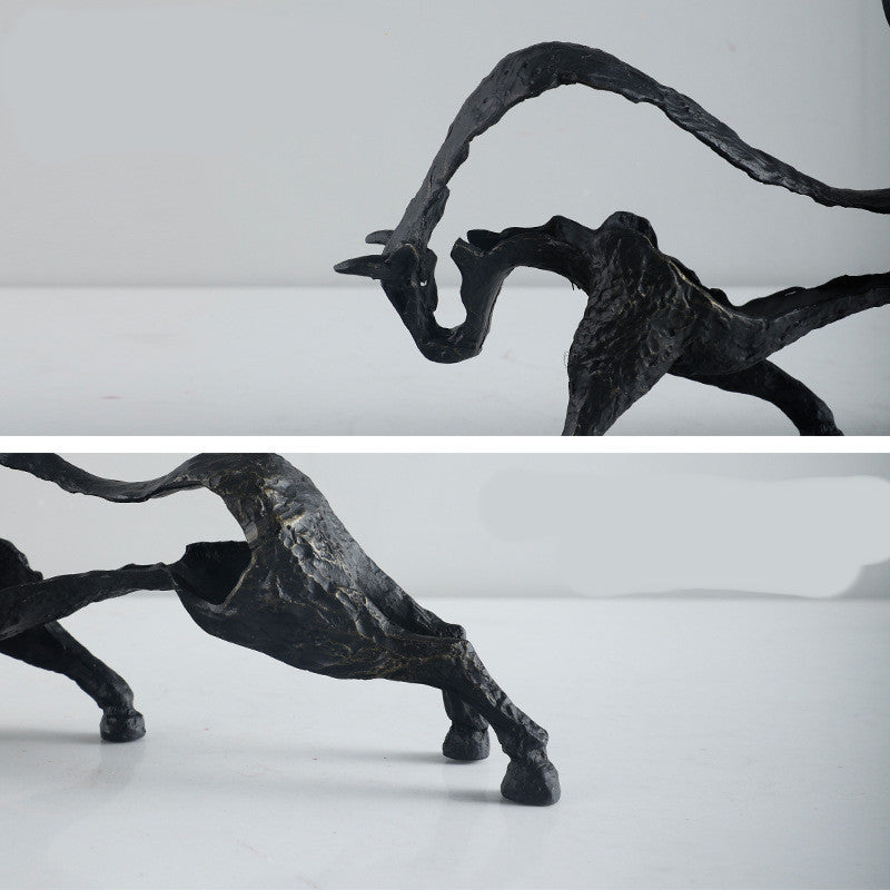 Bronze sculpture of a horse on a white background