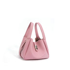 Pink handbag on a white background