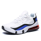 White sneaker with blue and black accents on a white background