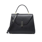 Black handbag with a strap on a white background