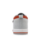 Gray sneaker with orange accents on a white background