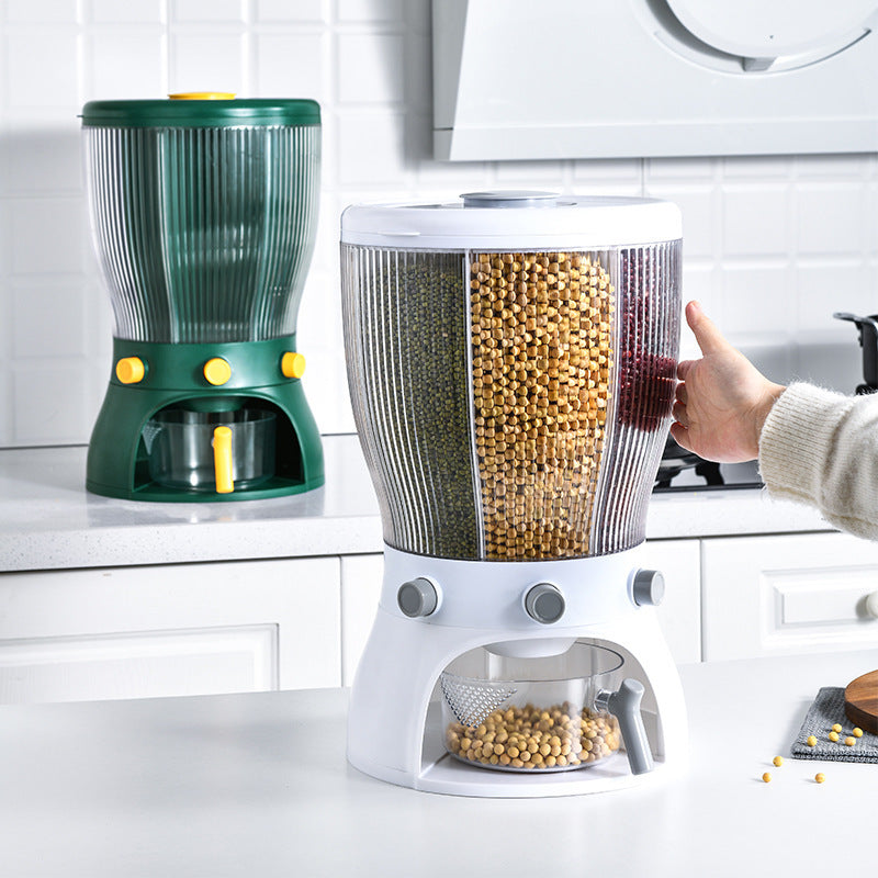 Kitchen food storage containers with a person reaching into one of them.