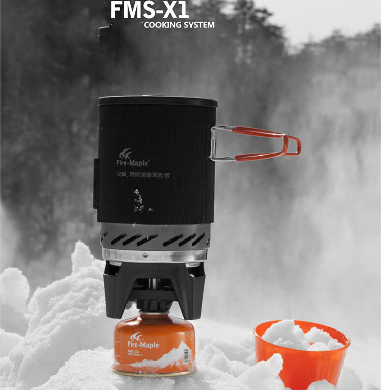 Fire-Maple FMS-X1 cooking system in a snowy landscape