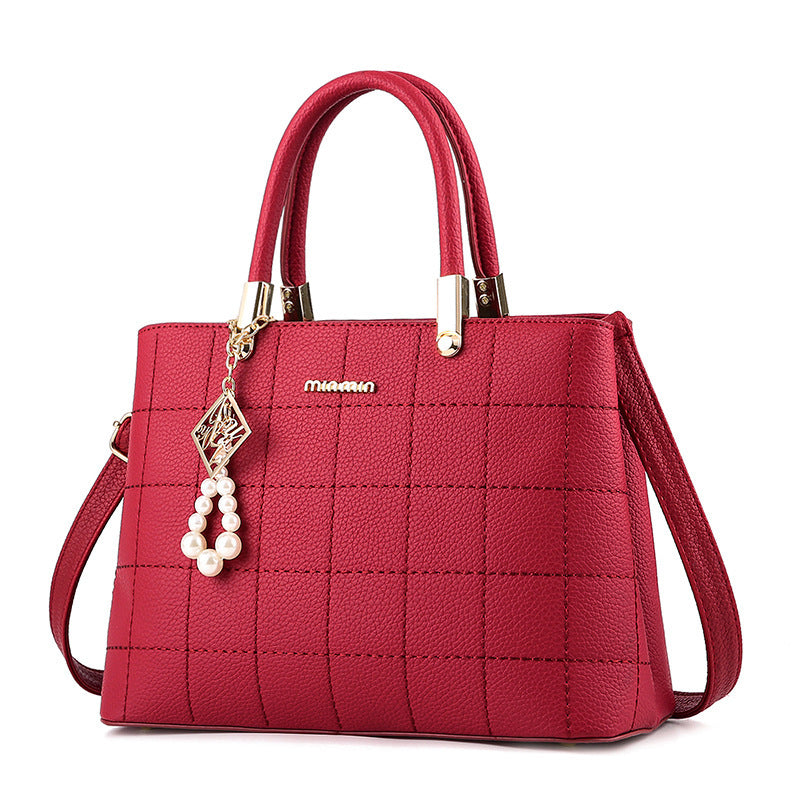 Aveline™ Soft Elegance Handbag with Charm Ball Accent