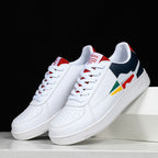 White sneakers with colorful design on a white background
