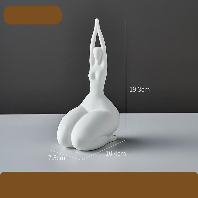 White ceramic sculpture of a person in a yoga pose with measurements on a gray background
