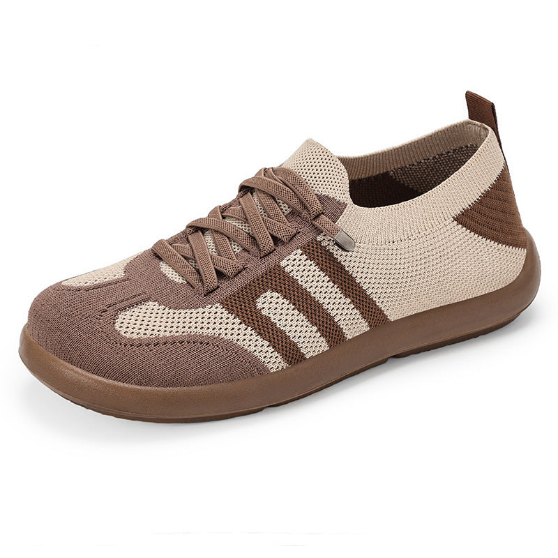 Brown and beige sneaker on a white background