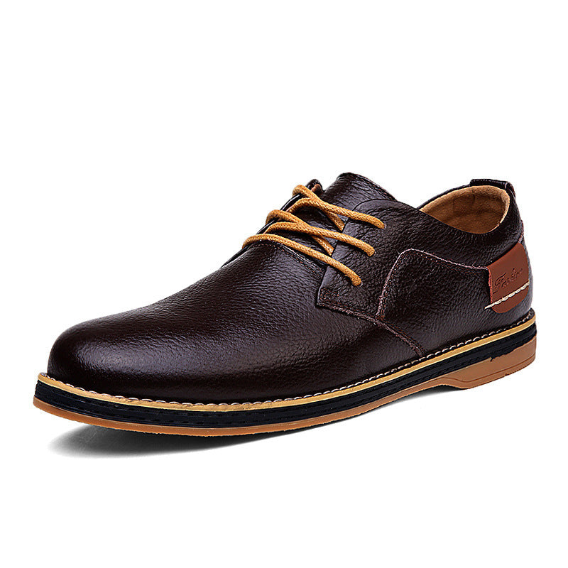 Brown leather shoe with tan laces on a white background