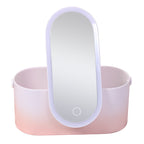 Pink handheld mirror with light on a white background
