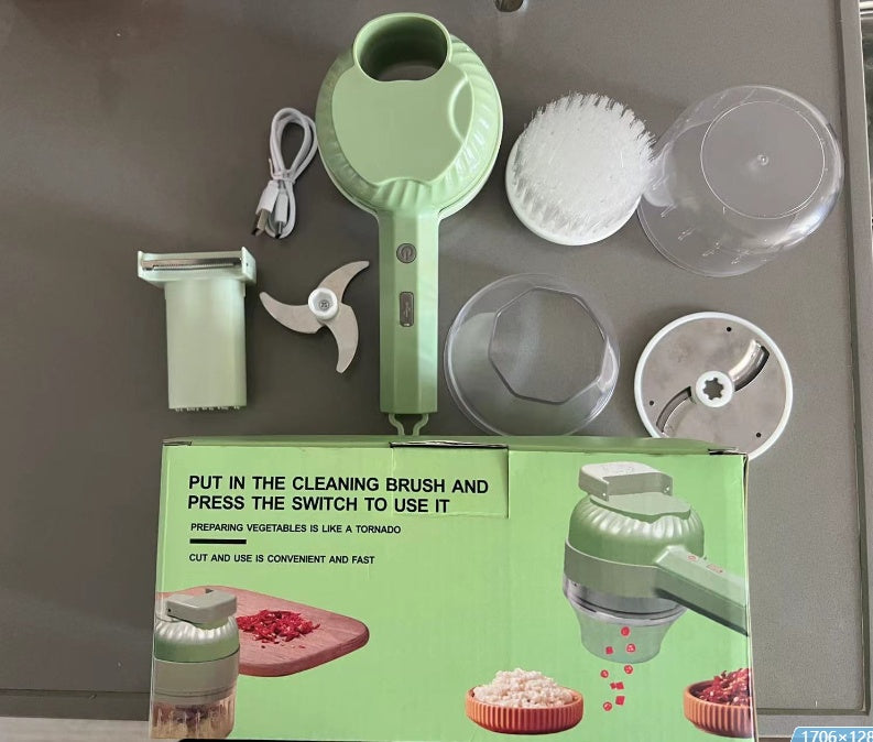 Green kitchen tool set with packaging on a gray surface