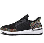 Multicolored sneaker with black and white accents on a white background