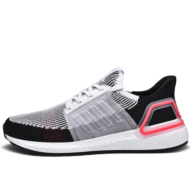 Black and white running shoe with red accents on a white background