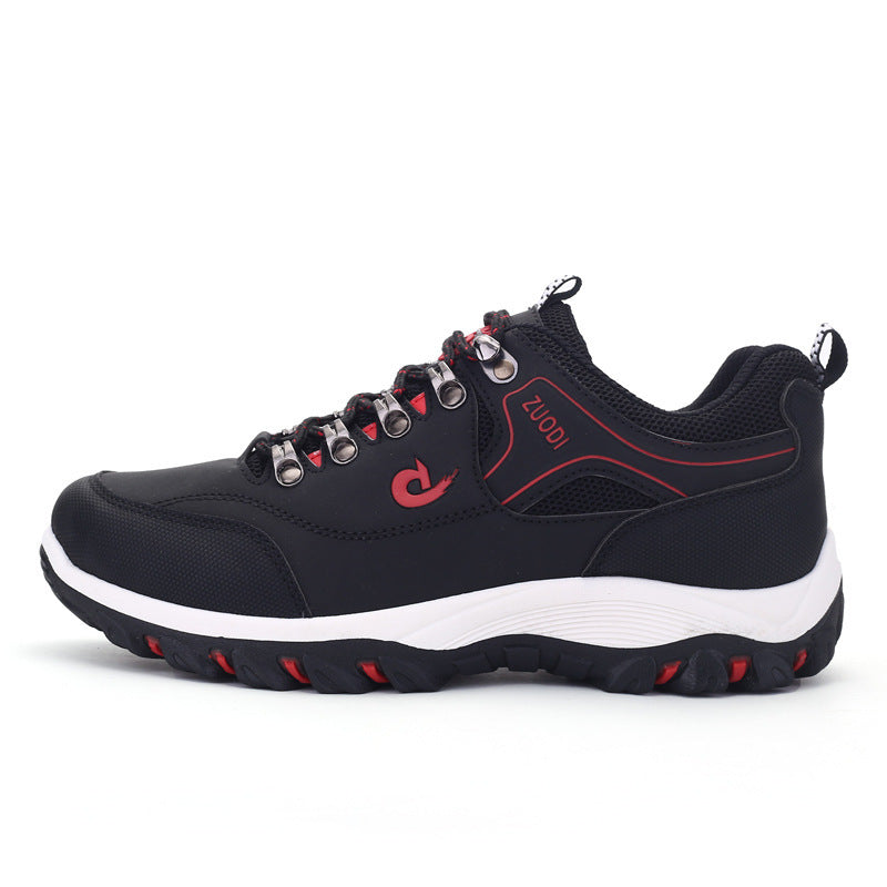 Black and red sneaker with white sole on a white background