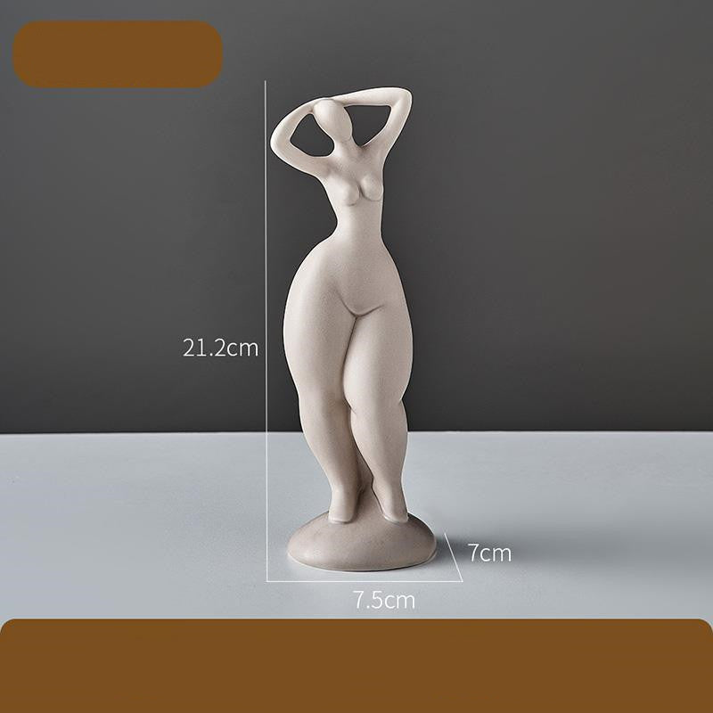 White ceramic figurine of a standing woman with measurements on a gray background