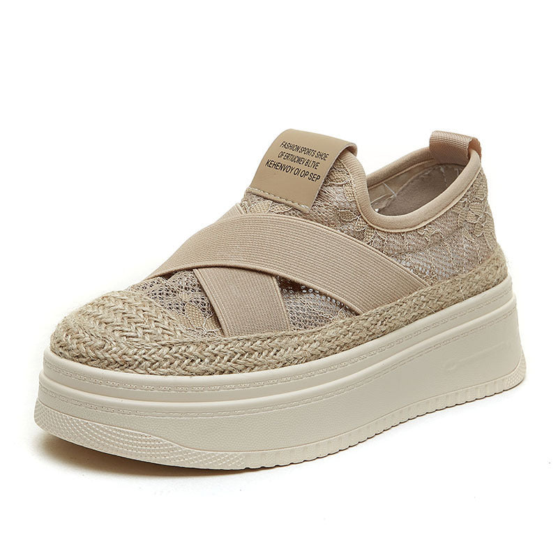 Beige sneaker with woven details on a white background