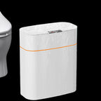 White cylindrical water heater with orange accent in a bathroom setting