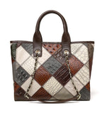 Patchwork handbag with brown, gray, and white pattern on a white background
