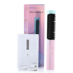 Wireless hair straightening comb with packaging on a white background