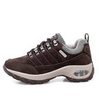 Brown sneaker with white sole on a white background