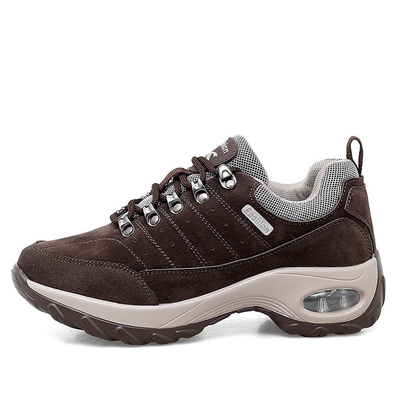 Brown sneaker with white sole on a white background