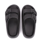 Black sandals with multiple straps on a white background