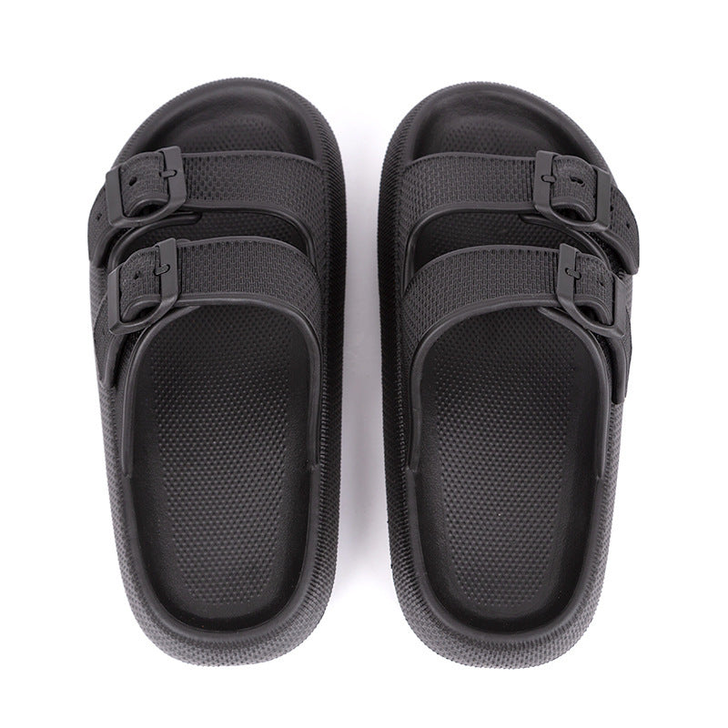Black sandals with multiple straps on a white background
