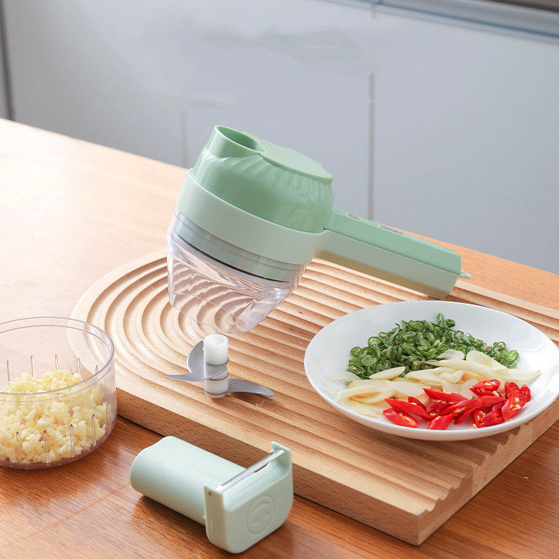 Vegetable chopper on a wooden cutting board with chopped vegetables and a bowl of ingredients.