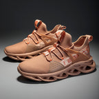 Pair of brown sneakers on a dark background