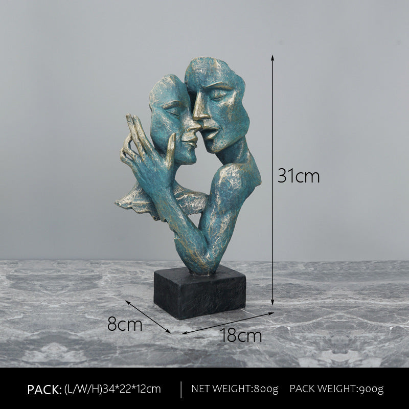 Abstract sculpture of two faces on a gray background with dimensions indicated.