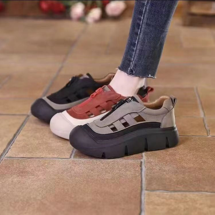 Three pairs of platform shoes in different colors on a tiled floor.