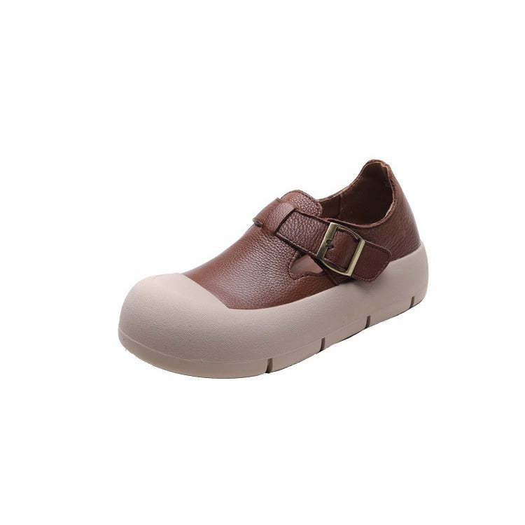 Brown shoe with a white sole on a white background
