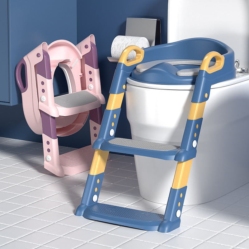 Two children's toilet seats with ladders in a bathroom setting.
