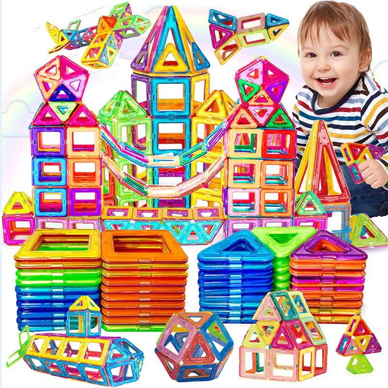 Colorful magnetic building blocks set with a child playing with them.
