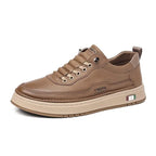 Brown sneaker with brand logo on a white background