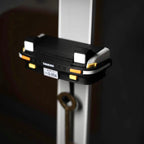 Phone mount on a stand with a dark background