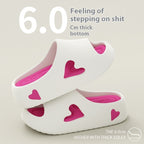 White shoes with pink hearts and text about thickness on a beige background