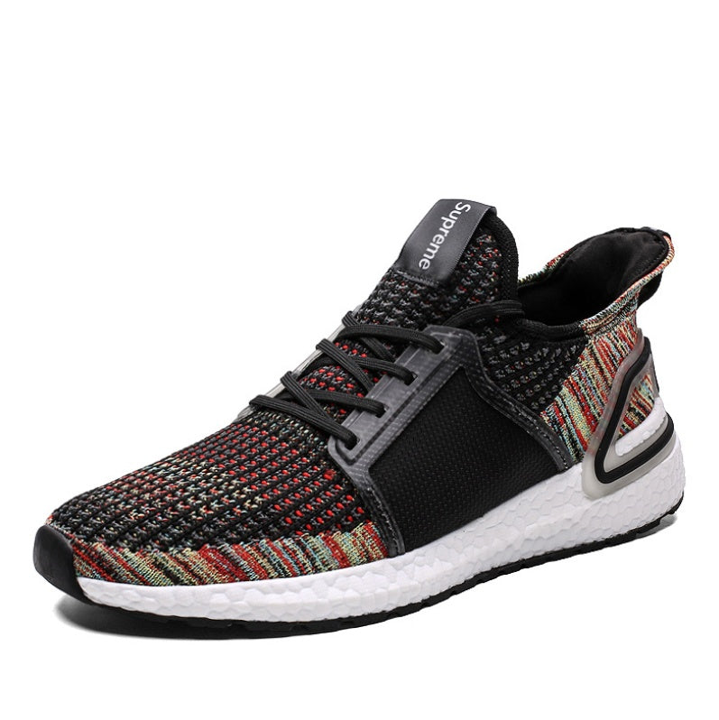 Multicolored sneaker with black accents on a white background