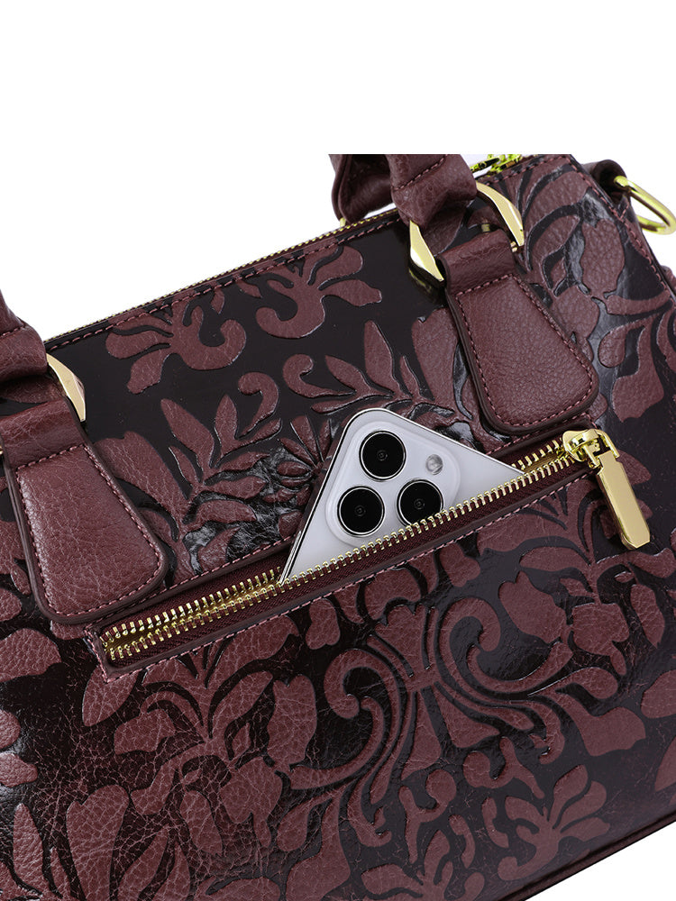 Patterned handbag with a phone case on a white background