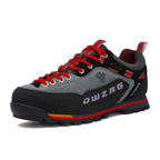 Gray and black outdoor shoe with red accents on a white background