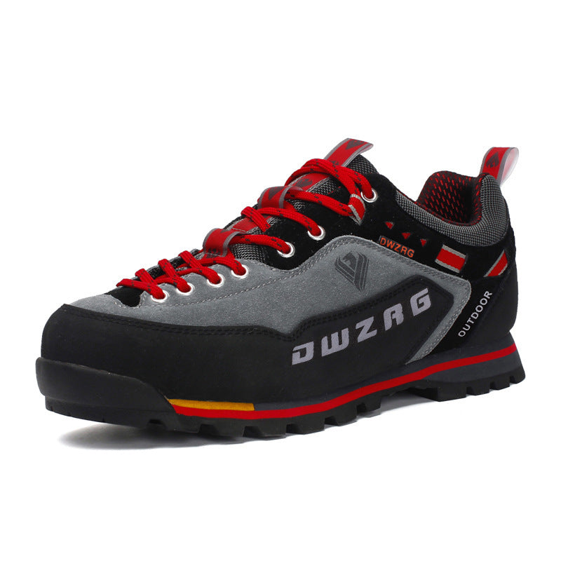 Gray and black outdoor shoe with red accents on a white background