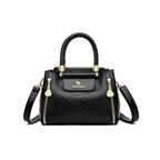 Black handbag with gold accents on a white background