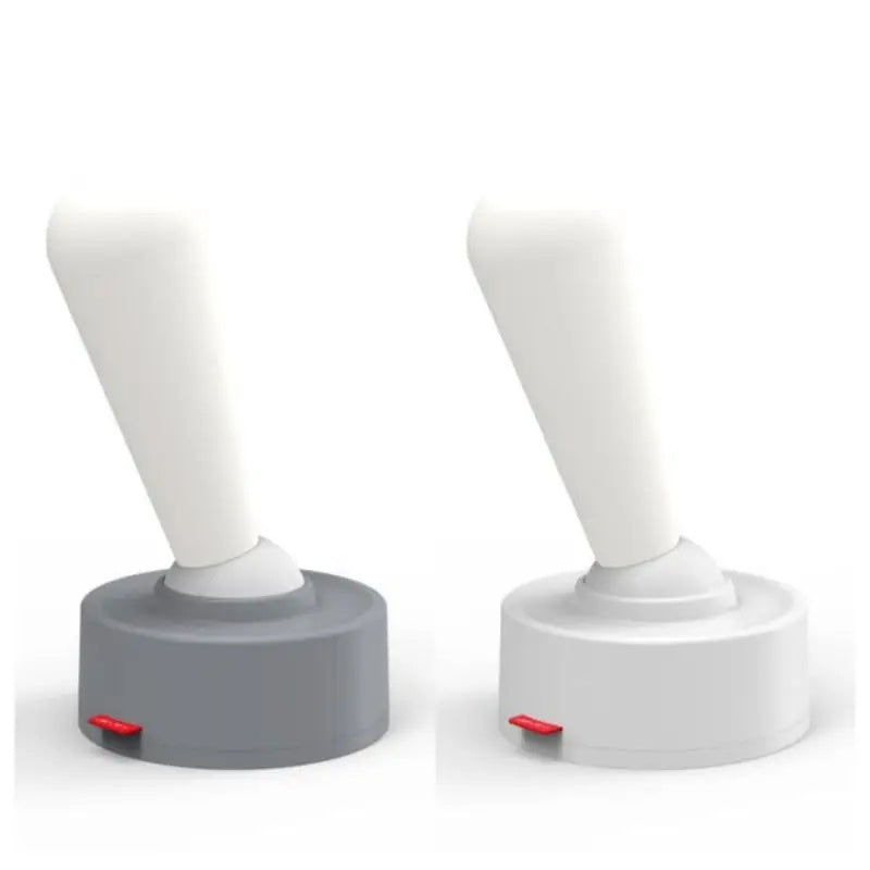 Two white joystick-like controllers with gray bases on a white background