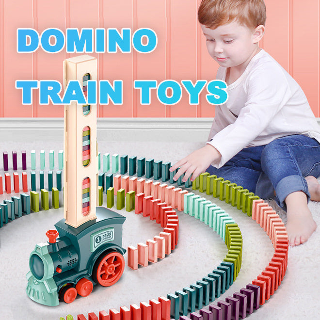 Child playing with a colorful domino train toy set on a pink floor.