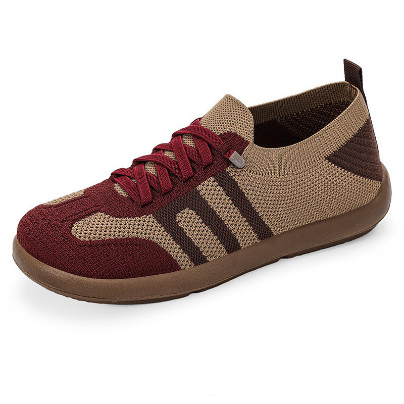 Brown and red sneaker on a white background