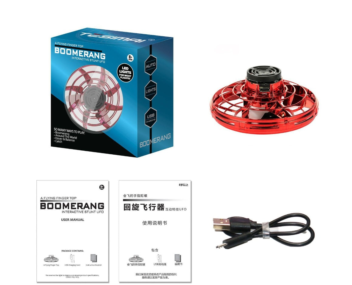 Boomerang interactive flying toy set with packaging, toy, USB cable, and user manual on a white background.