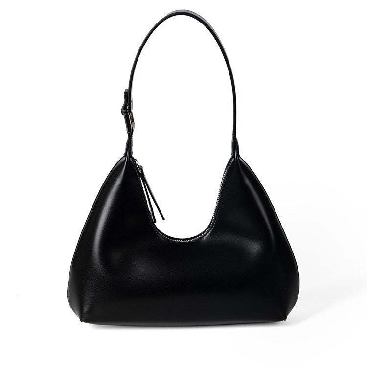 Black handbag on a white background
